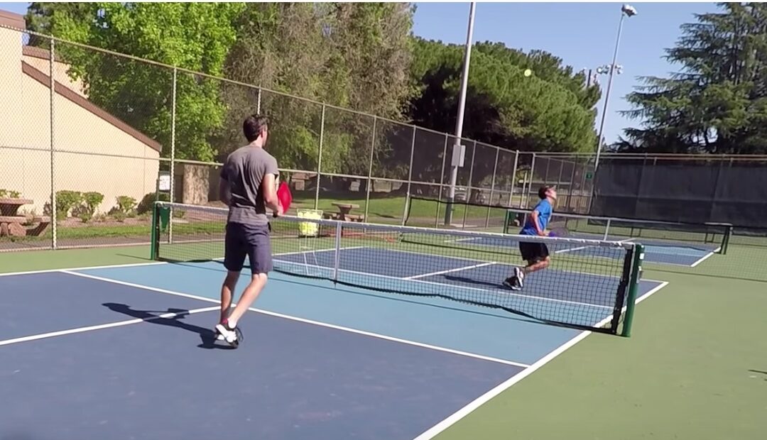 beating a pickleball lobber
